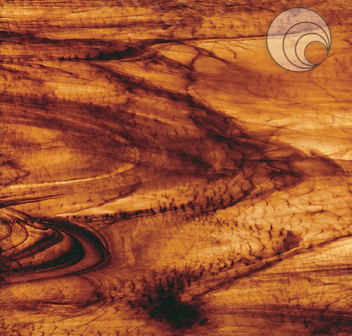 Close-up image of a brown gold streaky granite textured stained glass sheet.