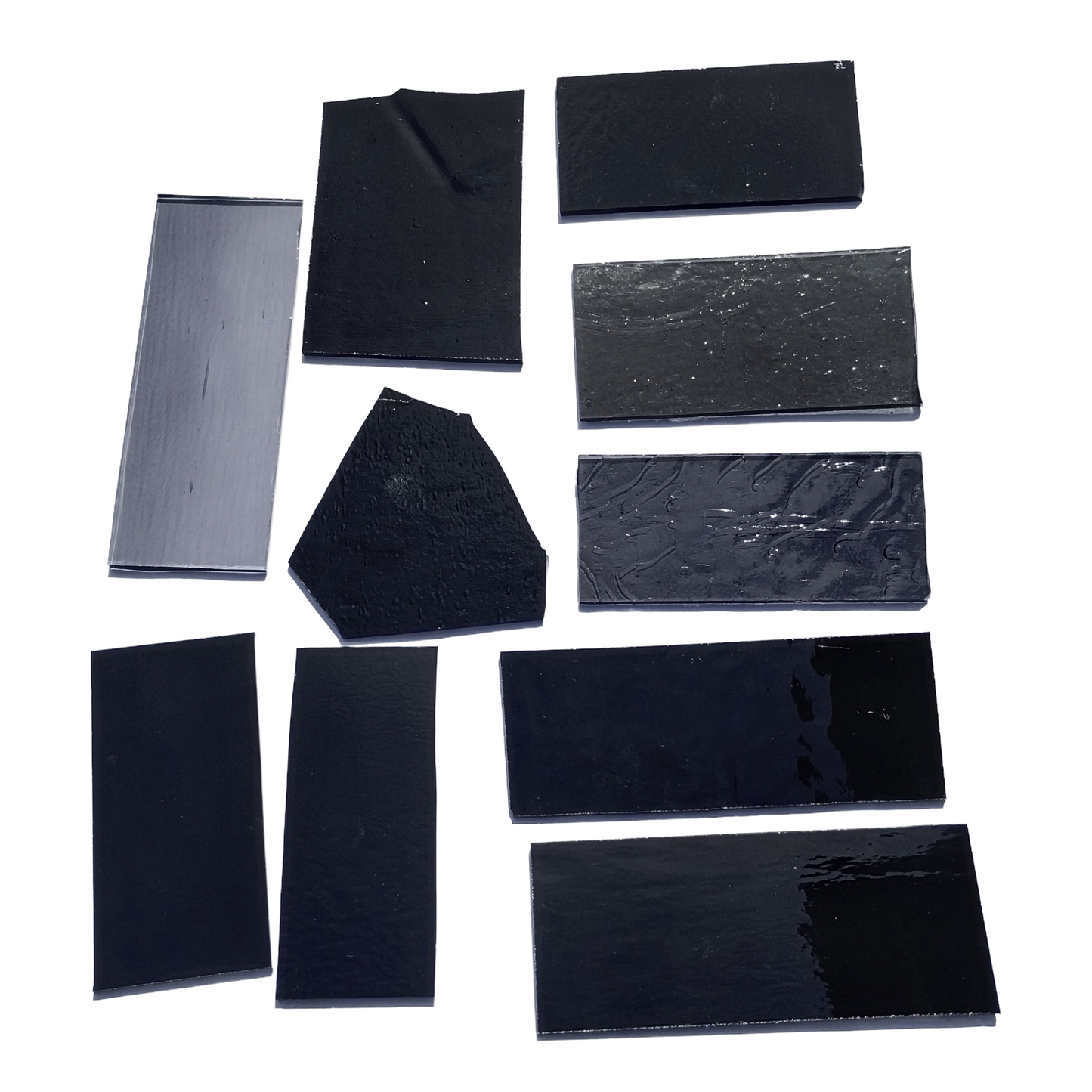 Assorted Black and Gray Stained Glass Scrap Pieces, Curated 1 lb Package. Hand picked, sorted by color, clean. Black, gray art glass assortment perfect for stained glass and mosaic art. Ships carefully in 1 business day. Free shipping available.