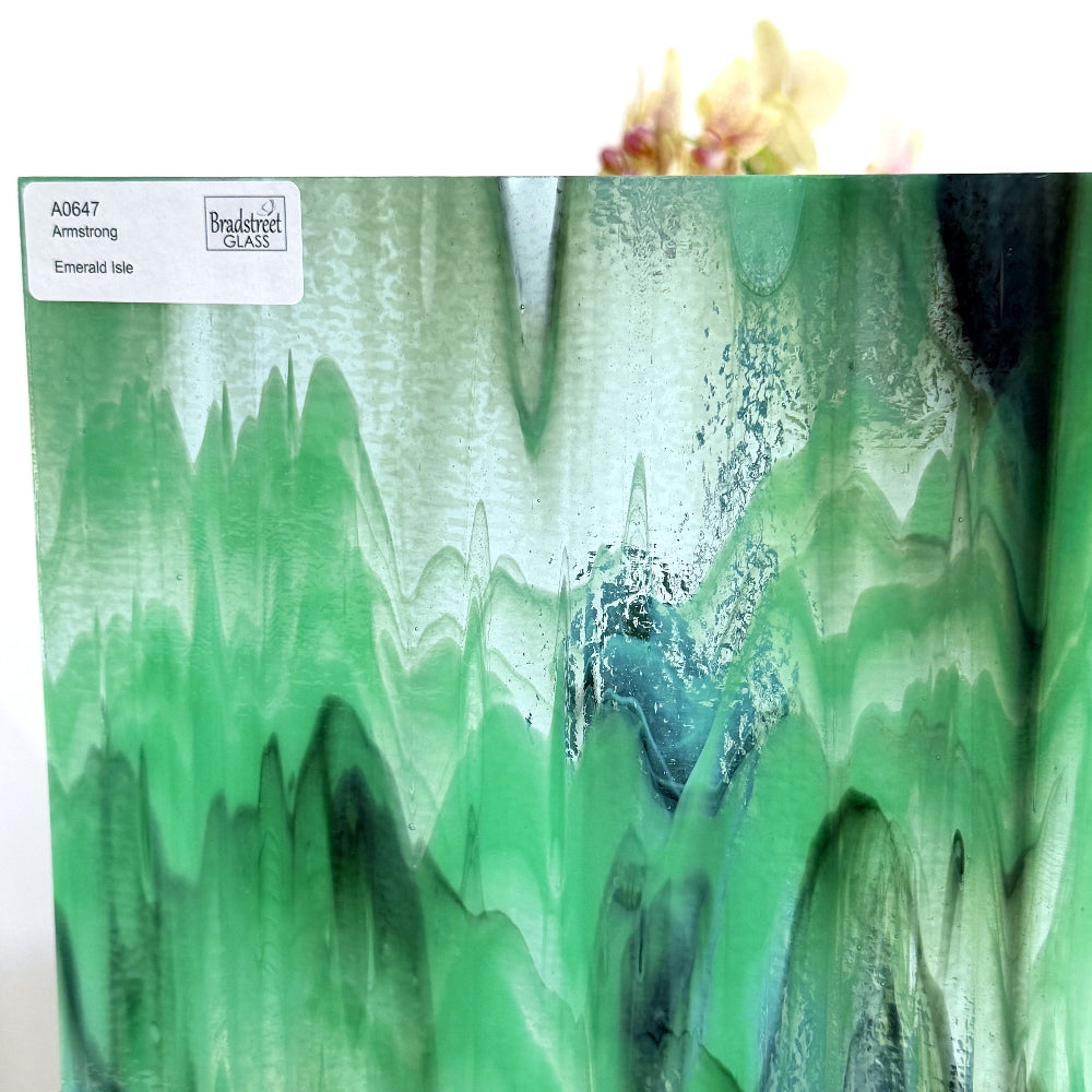 Armstrong 0647 Stained Glass Sheet
Emerald Isle: Streaky Opaque Greens on Clear w Opal.  Swirled green art glass at Bradstreet Glass.