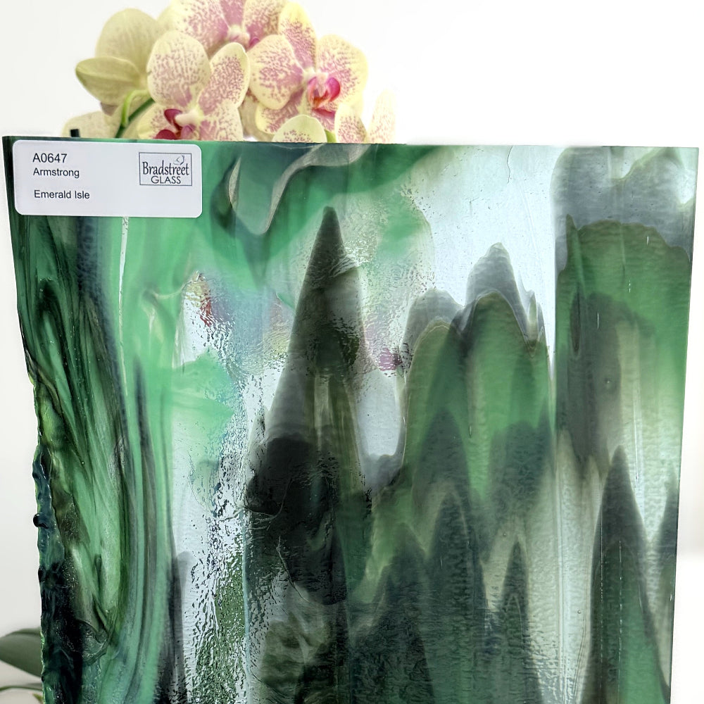 Armstrong 0647 Stained Glass Sheet
Emerald Isle: Streaky Opaque Greens on Clear w Opal.  Swirled green art glass at Bradstreet Glass.