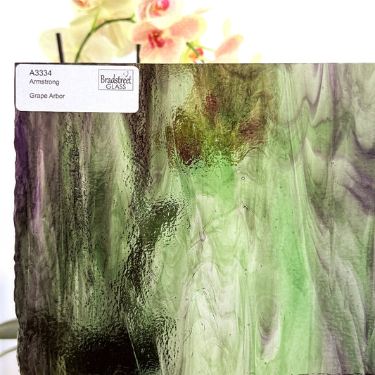 Armstrong 3334 Stained Glass Sheet
Grape Arbor: Streaky Opaque Green and Purple on Clear art glass at Bradstreet Glass.