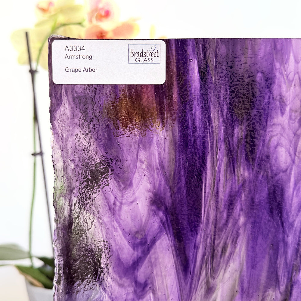 Armstrong 3334 Stained Glass Sheet
Grape Arbor: Streaky Opaque Green and Purple on Clear art glass at Bradstreet Glass.