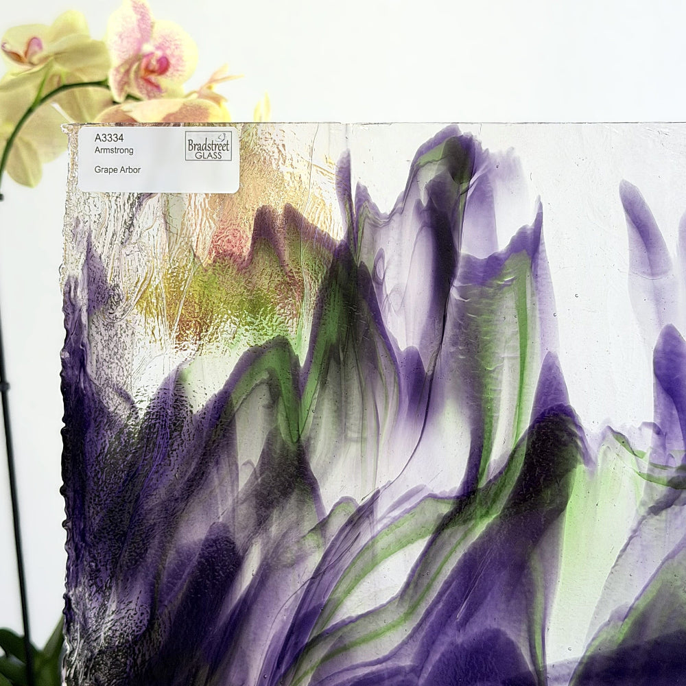 Armstrong 3334 Stained Glass Sheet
Grape Arbor: Streaky Opaque Green and Purple on Clear art glass at Bradstreet Glass.