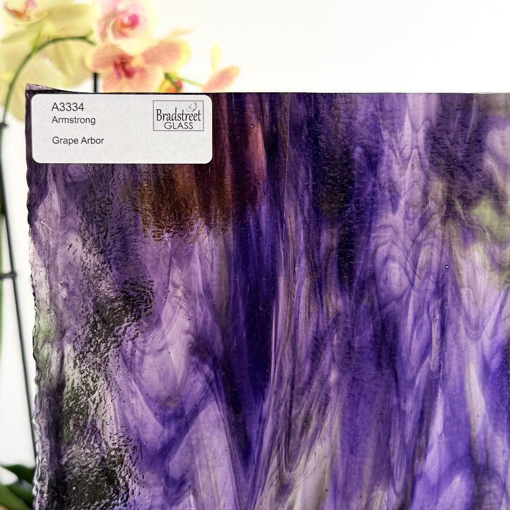 Armstrong 3334 Stained Glass Sheet
Grape Arbor: Streaky Opaque Green and Purple on Clear art glass at Bradstreet Glass.