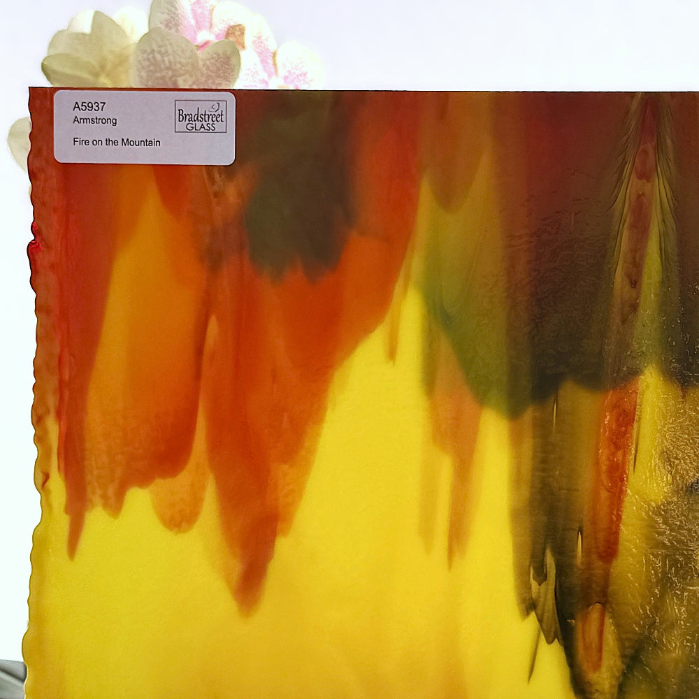 Armstrong 5937 Fire On The Mountain, Red, Yellow, Green Streaky Stained Glass Sheet. Opaque streaky art glass at Bradstreet Glass.