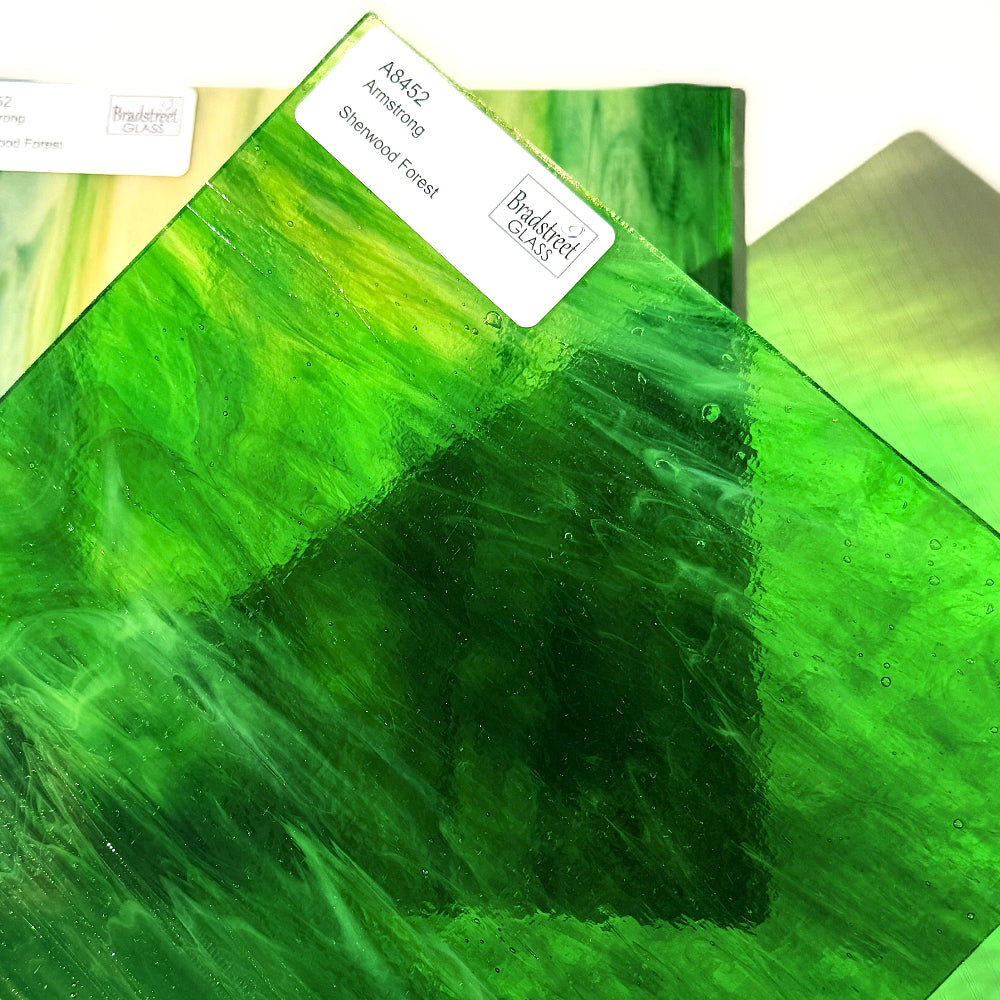 Armstrong 8452 Stained Glass Sheet Sherwood Forest: Streaky Green and Amber on Clear and Opal art glass at Bradstreet Glass