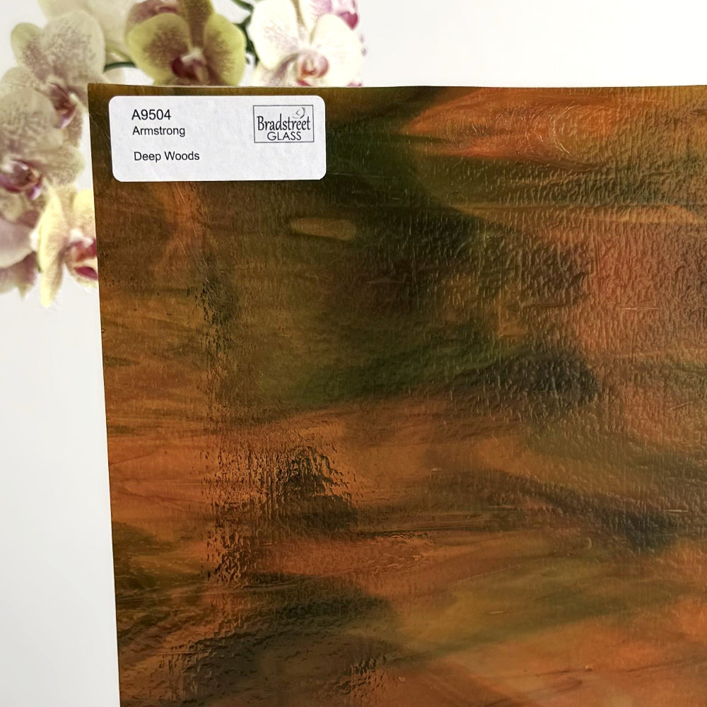 Armstrong 9504 Stained Glass Sheet Deep Woods: Dark Brown and Bright Golden Ambers with Greens. Streaky swirled art glass at Bradstreet Glass.