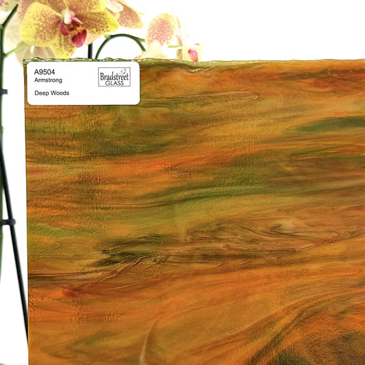 Armstrong 9504 Stained Glass Sheet Deep Woods: Dark Brown and Bright Golden Ambers with Greens. Streaky swirled art glass at Bradstreet Glass.