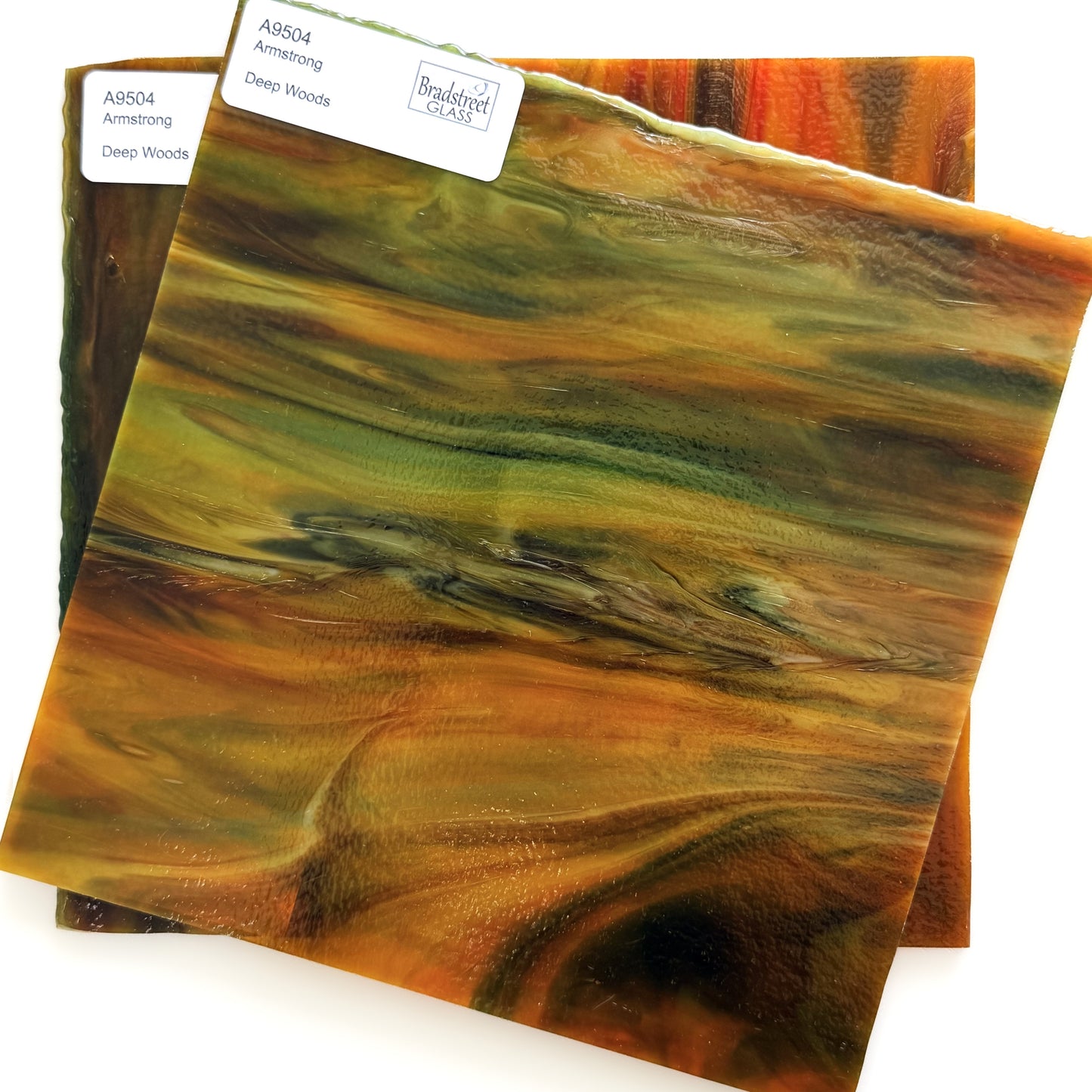 Armstrong 9504 Stained Glass Sheet Deep Woods: Dark Brown and Bright Golden Ambers with Greens. Streaky swirled art glass at Bradstreet Glass.
