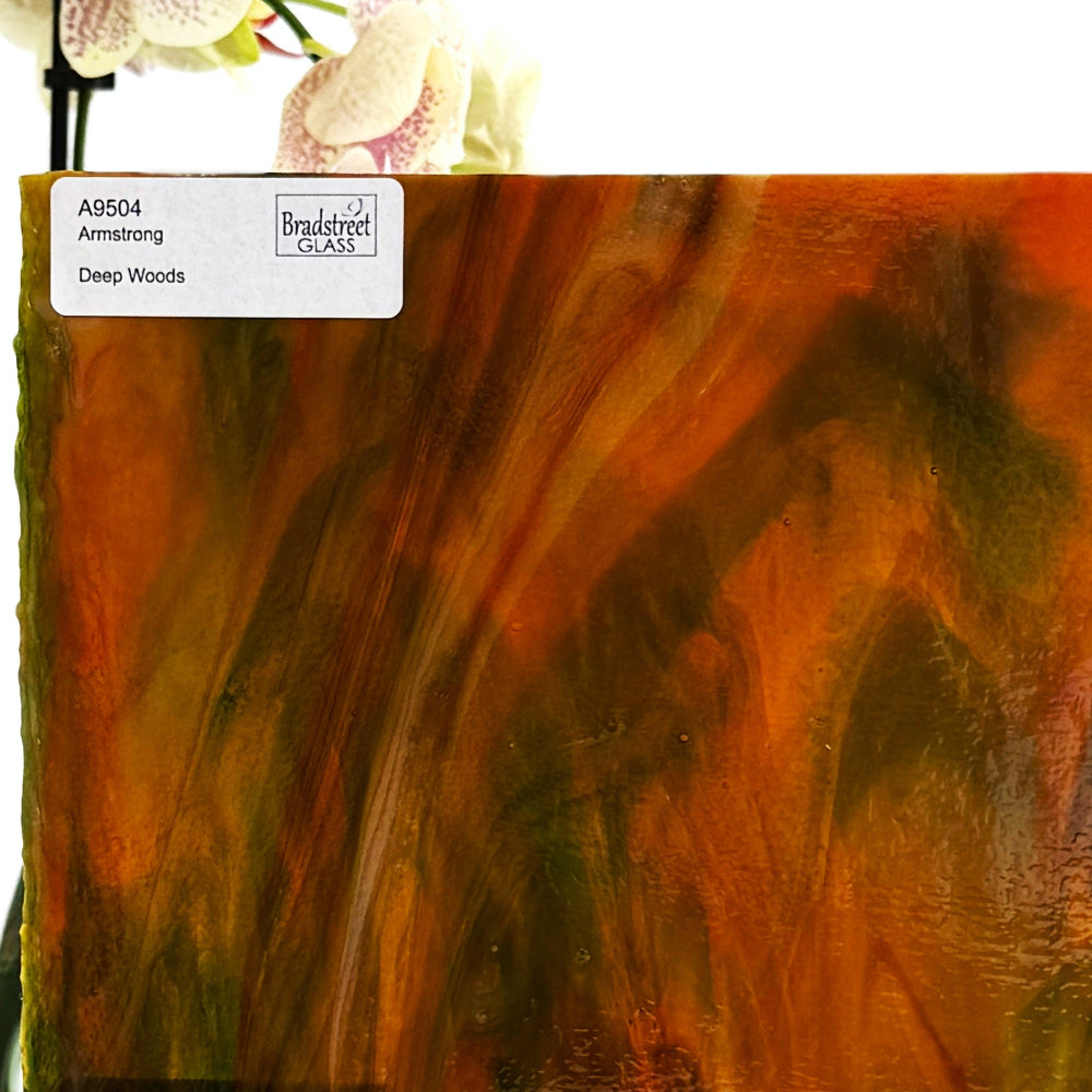 Armstrong 9504 Stained Glass Sheet Deep Woods: Dark Brown and Bright Golden Ambers with Greens. Streaky swirled art glass at Bradstreet Glass.
