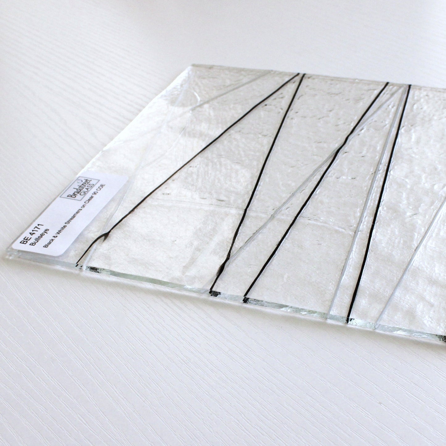 Bullseye 4171 Stained Glass Sheet 
Black and White Stringers on Clear 90 COE Fusible Art Glass. Bradstreet Glass
