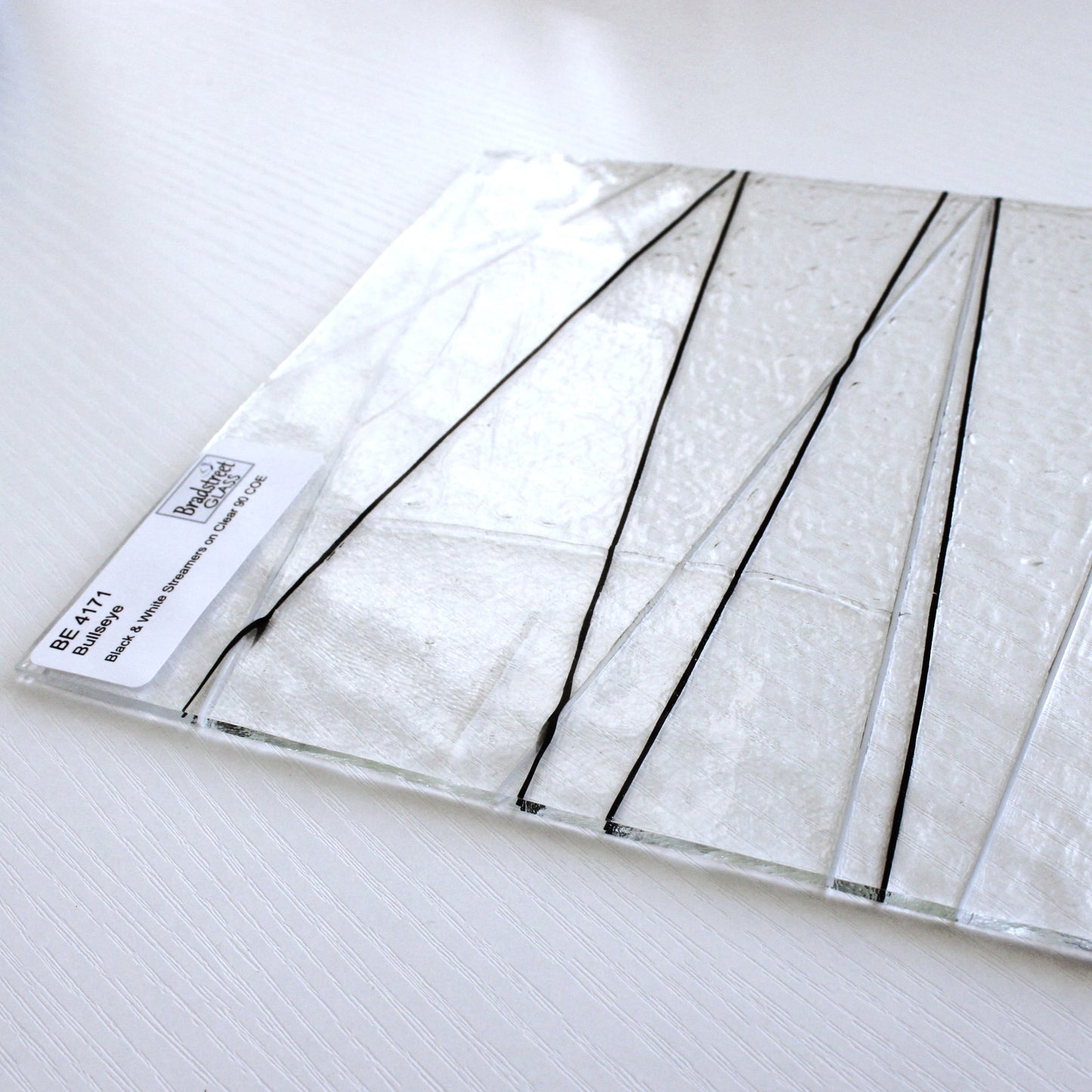 Bullseye 4171 Stained Glass Sheet 
Black and White Stringers on Clear 90 COE Fusible Art Glass. Bradstreet Glass