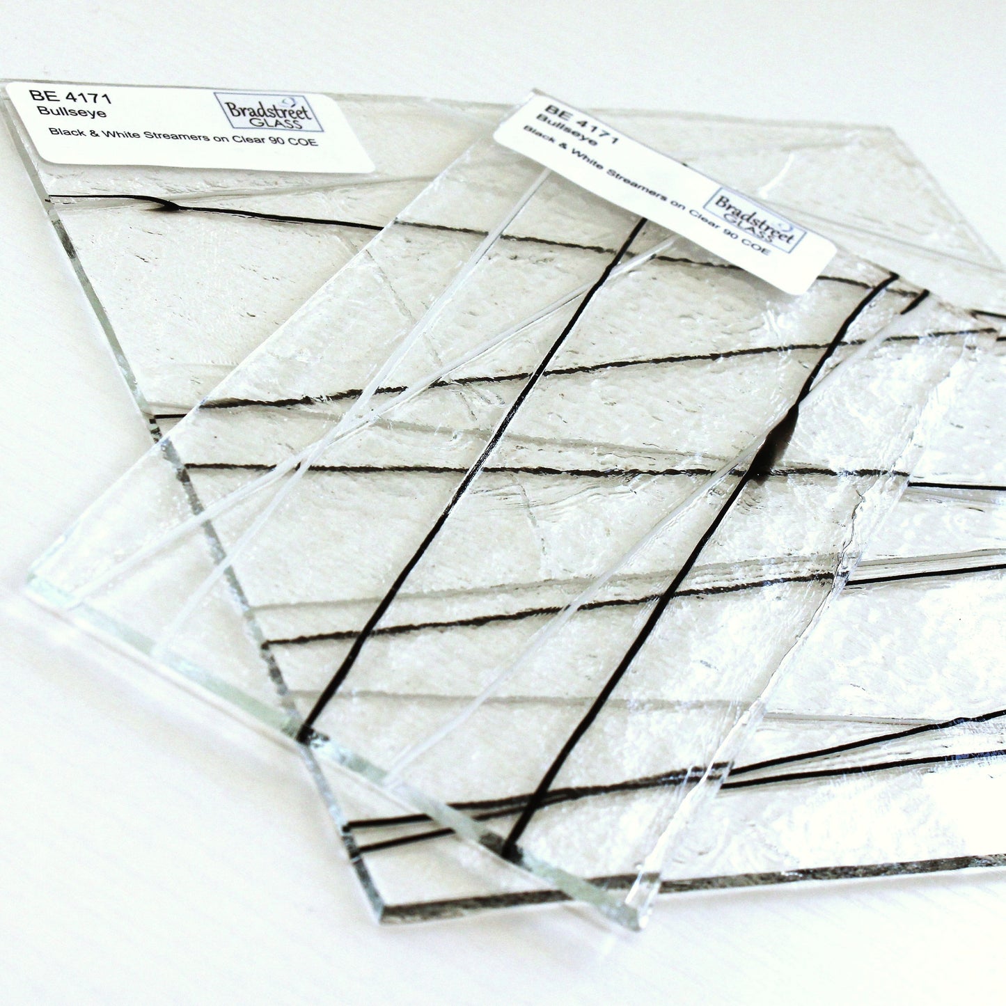 Bullseye 4171 Stained Glass Sheet 
Black and White Stringers on Clear 90 COE Fusible Art Glass. Bradstreet Glass