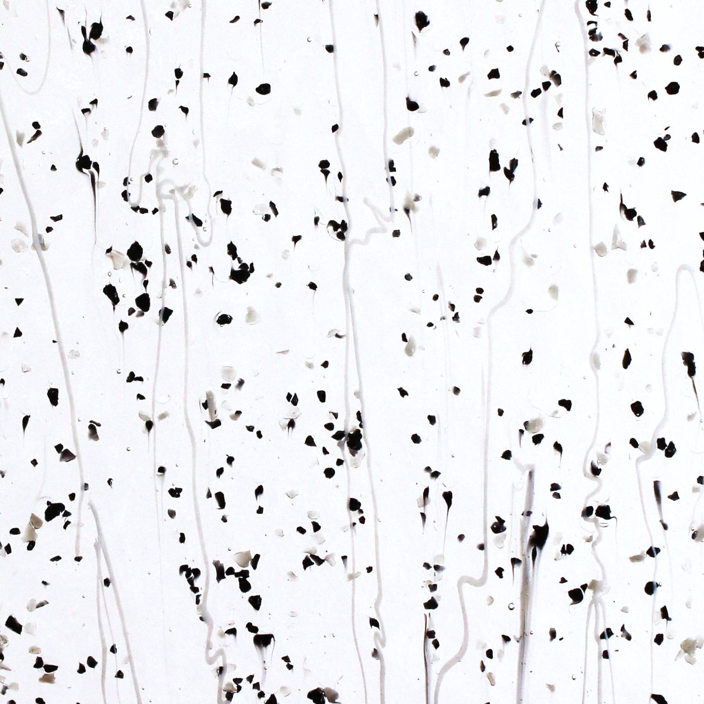 Gray & Black Frit, White Streamers on Clear Stained Glass Sheet. Bullseye 4218 Fusible 90 COE Fusible stringer glass, fusible frit glass.  Bradstreet Glass
