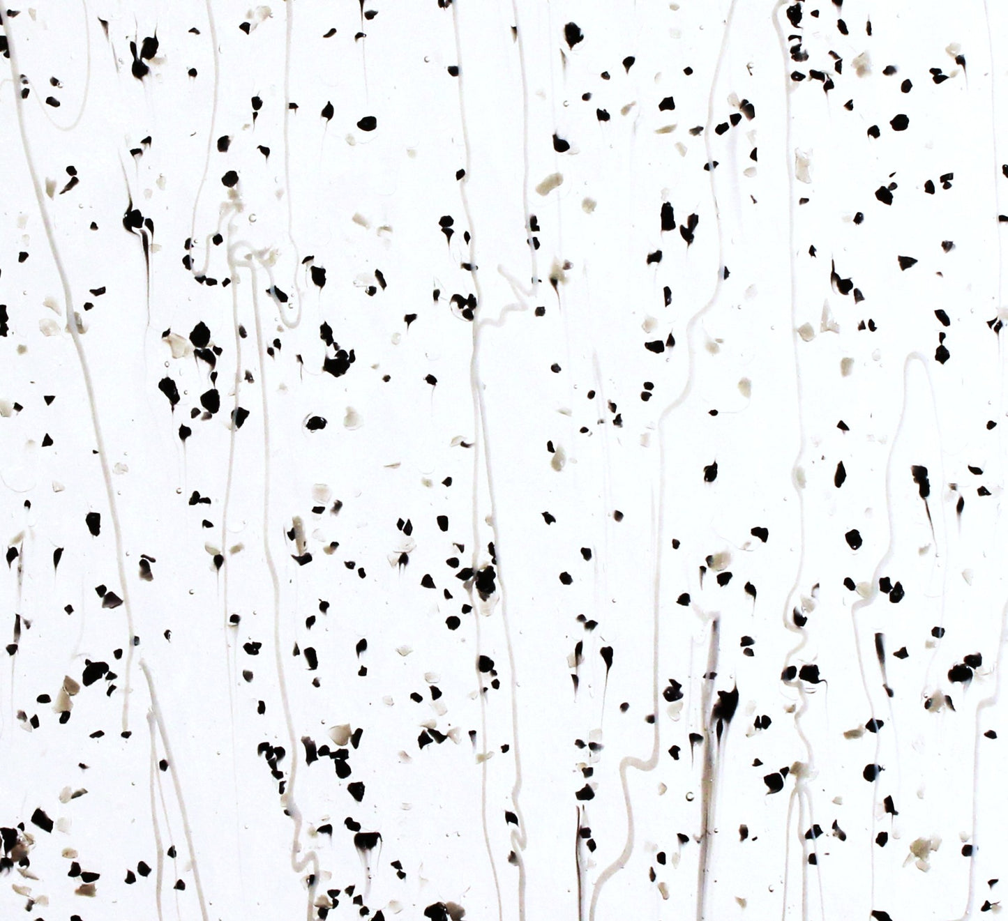 Gray & Black Frit, White Streamers on Clear Stained Glass Sheet. Bullseye 4218 Fusible 90 COE Fusible stringer glass, fusible frit glass.  Bradstreet Glass