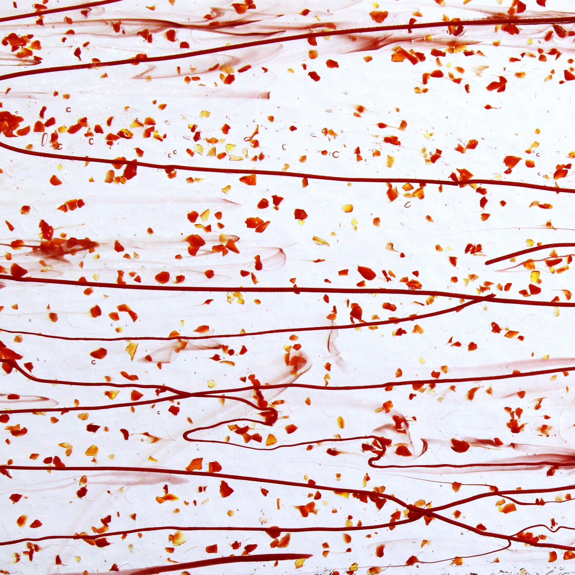 Bullseye 4224 Stained Glass sheet, red frit & red stringers on clear 90 COE fusible art glass. Bradstreet Glass
