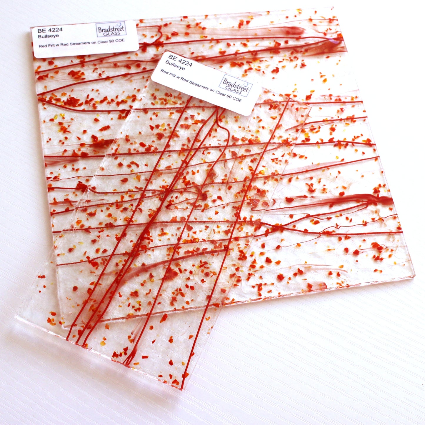 Bullseye 4224 Stained Glass sheet, red frit & red stringers on clear 90 COE fusible art glass. Bradstreet Glass