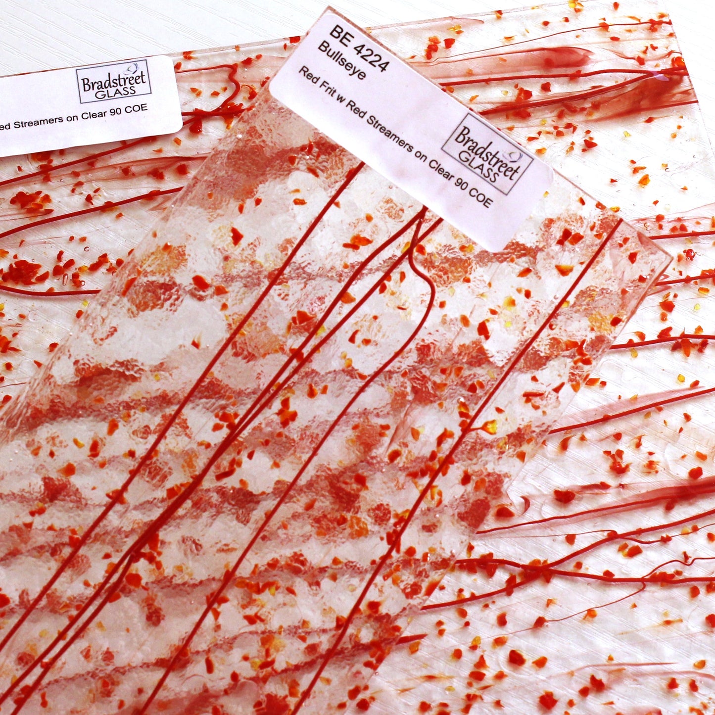 Bullseye 4224 Stained Glass sheet, red frit & red stringers on clear 90 COE fusible art glass. Bradstreet Glass