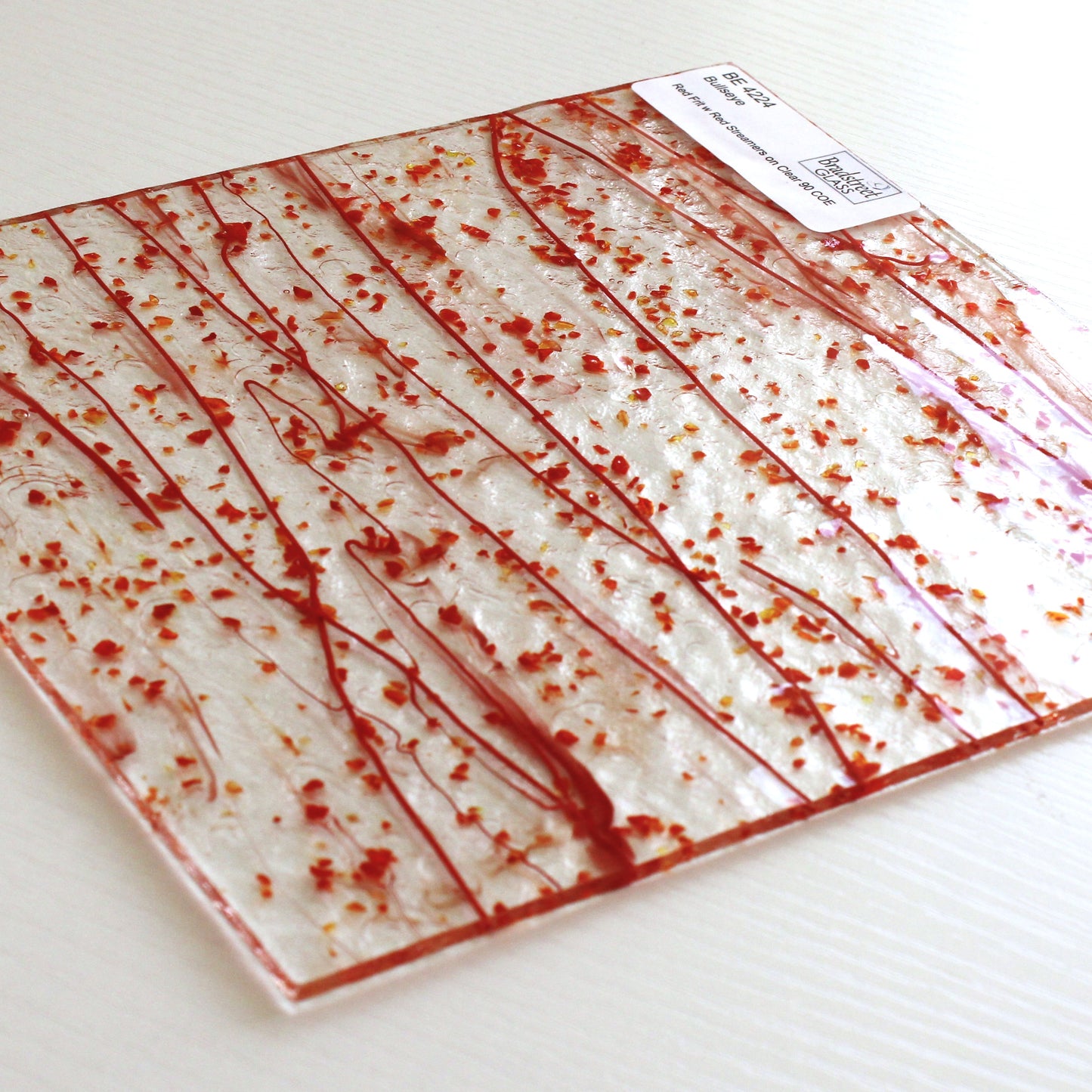 Bullseye 4224 Stained Glass sheet, red frit & red stringers on clear 90 COE fusible art glass. Bradstreet Glass