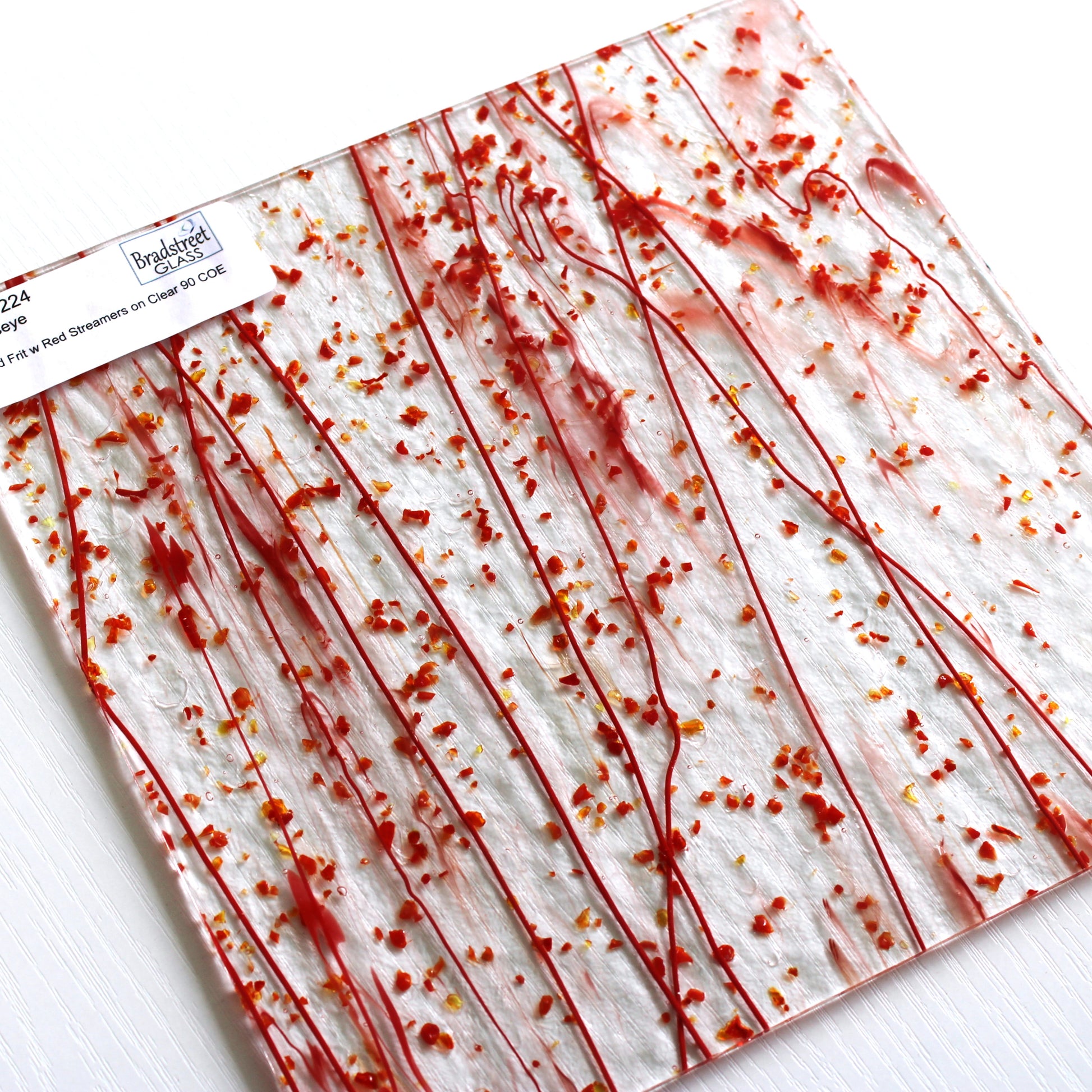 Bullseye 4224 Stained Glass sheet, red frit & red stringers on clear 90 COE fusible art glass. Bradstreet Glass