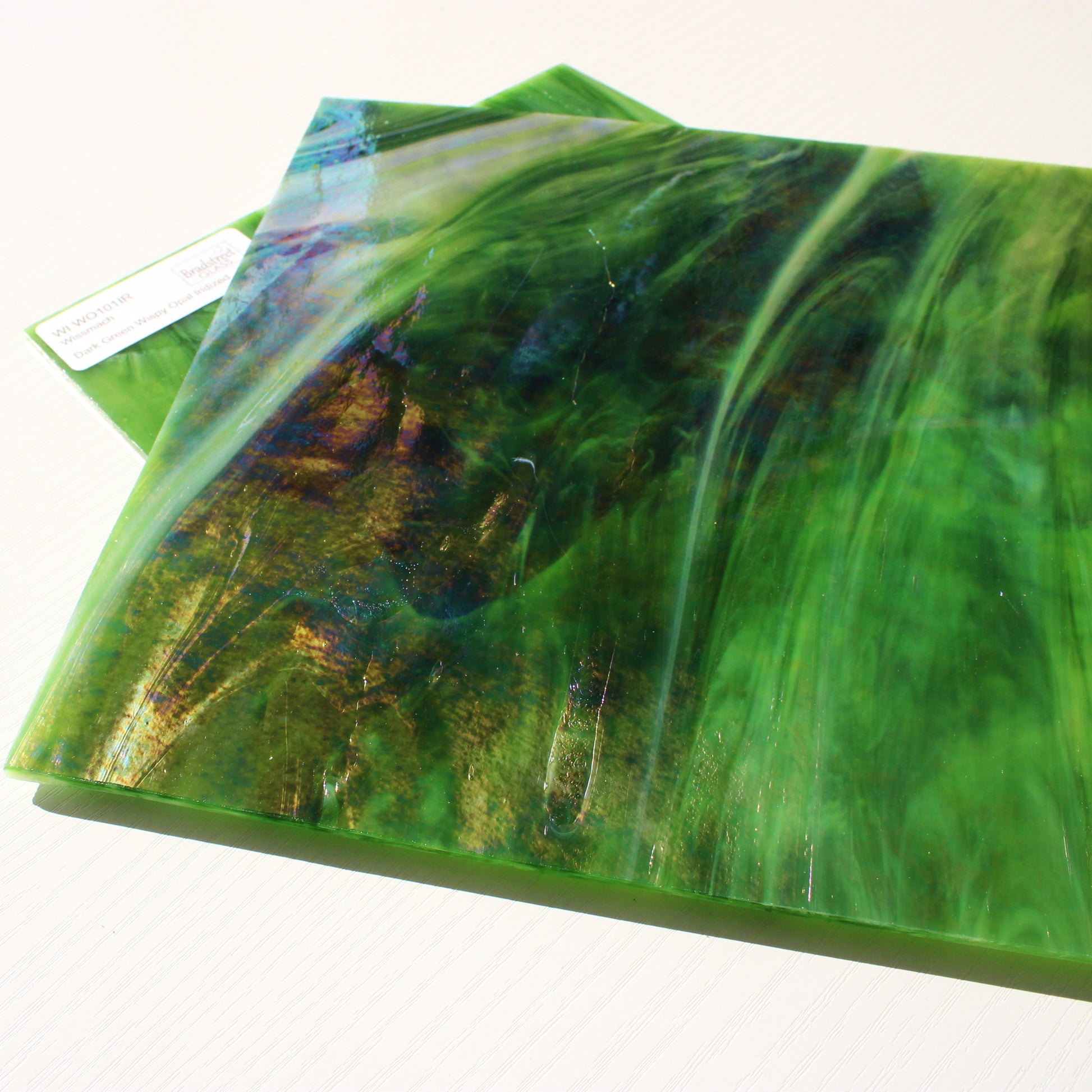 Dark Green Wispy Opal Iridized Stained Glass Sheet Wissmach WO101IR Green Swirled Iridescent Art Glass at Bradstreet Glass