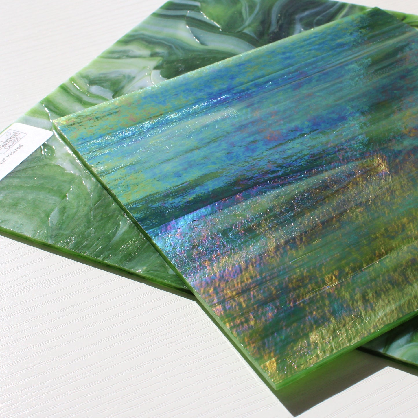 Dark Green Wispy Opal Iridized Stained Glass Sheet Wissmach WO101IR Green Swirled Iridescent Art Glass at Bradstreet Glass