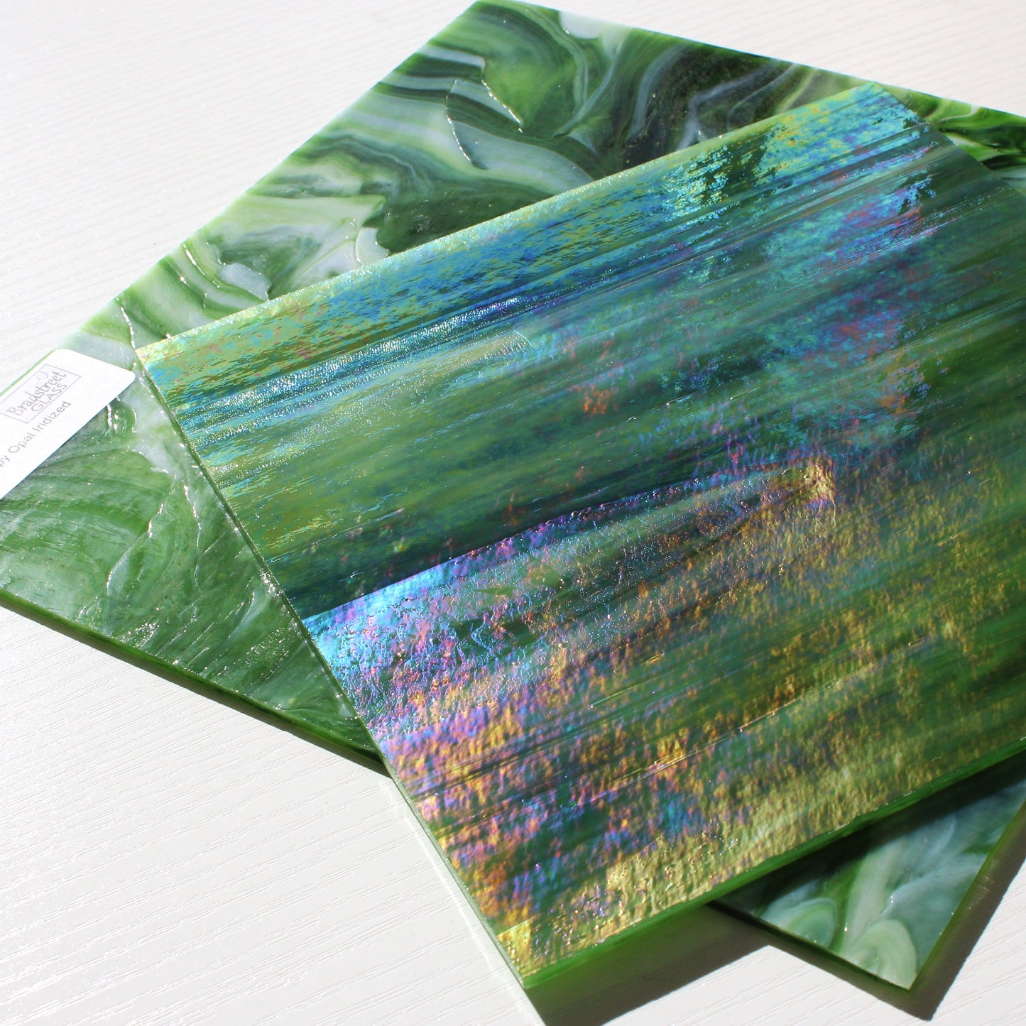 Dark Green Wispy Opal Iridized Stained Glass Sheet Wissmach WO101IR Green Swirled Iridescent Art Glass at Bradstreet Glass